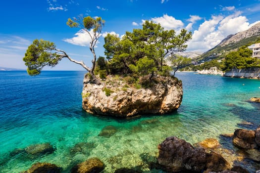 Kamen Brela symbol of the city of Brela on Adriatic coast of Dalmatia, Croatia. Kamen Brela, tiny famous island in Brela, Makarska Riviera, Dalmatia, Croatia.