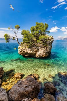 Kamen Brela symbol of the city of Brela on Adriatic coast of Dalmatia, Croatia. Kamen Brela, tiny famous island in Brela, Makarska Riviera, Dalmatia, Croatia.
