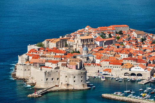 Dubrovnik a city in southern Croatia fronting the Adriatic Sea, Europe. Old city center of famous town Dubrovnik, Croatia. Picturesque view on Dubrovnik old town (medieval Ragusa) and Dalmatian Coast.