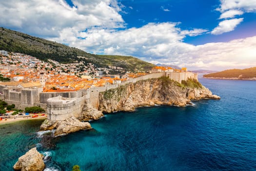 Dubrovnik a city in southern Croatia fronting the Adriatic Sea, Europe. Old city center of famous town Dubrovnik, Croatia. Picturesque view on Dubrovnik old town (medieval Ragusa) and Dalmatian Coast.