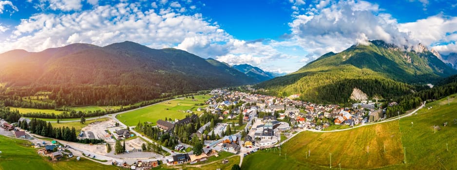 Kranjska Gora town in Slovenia at summer with beautiful nature and mountains in the background. View of mountain landscape next to Kranjska Gora in Slovenia, view from the top the town Kranjska Gora.