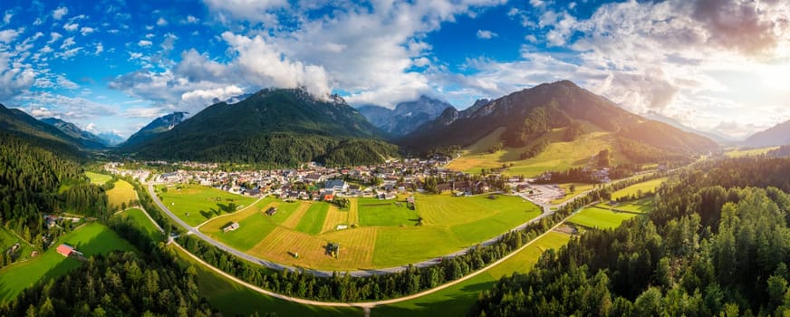 Kranjska Gora town in Slovenia at summer with beautiful nature and mountains in the background. View of mountain landscape next to Kranjska Gora in Slovenia, view from the top the town Kranjska Gora.