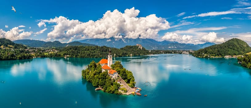 Lake Bled in Slovenia. Beautiful mountains and Bled lake with small Pilgrimage Church. Bled lake and island with Pilgrimage Church of the Assumption of Maria. Bled, Slovenia, Europe.