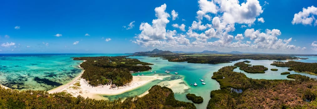 Ile aux Cerfs island with idyllic beach scene, aquamarine sea and soft sand, Ile aux Cerfs, Mauritius, Indian Ocean, Africa. Ile aux Cerf in Mauritius, beautiful water and breathtaking landscape.