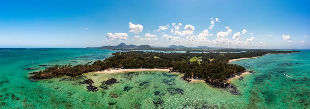 Ile aux Cerfs island with idyllic beach scene, aquamarine sea and soft sand, Ile aux Cerfs, Mauritius, Indian Ocean, Africa. Ile aux Cerf in Mauritius, beautiful water and breathtaking landscape.