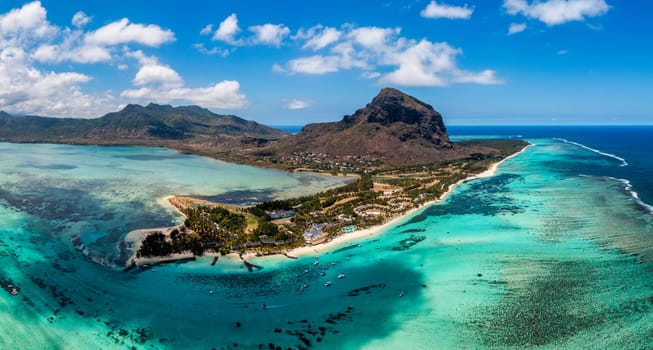 Tropical scenery, beautiful beaches of Mauritius island, Le Morne, popular luxury resort. Le Morne beach luxury resorts, Mauritius. Luxury beach in Mauritius, sandy beach with palms and blue ocean. 