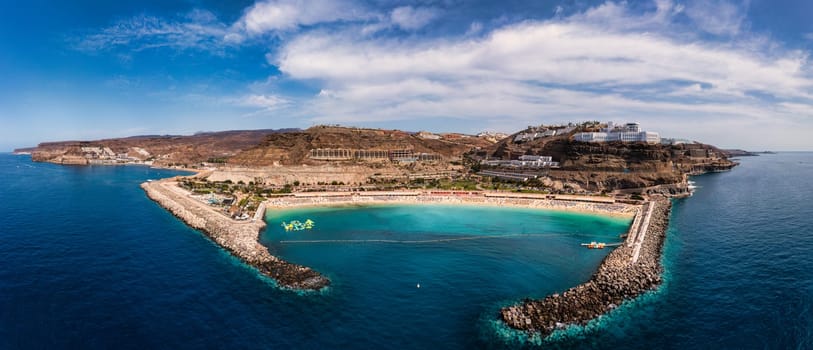 Amadores beach (Spanish: Playa del Amadores) near famous holiday resort Puerto Rico de Gran Canaria on Gran Canaria island, Spain. Playa de Amadores beach near Puerto Rico town, Canary Islands. Spain