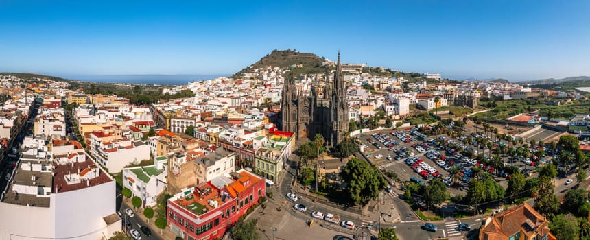 Aerial view of the Parroquia de San Juan Bautista de Arucas church in Arucas town, Gran Canaria, Canary Islands, Spain. Historic Neo-Gothic cathedral in Arucas. 