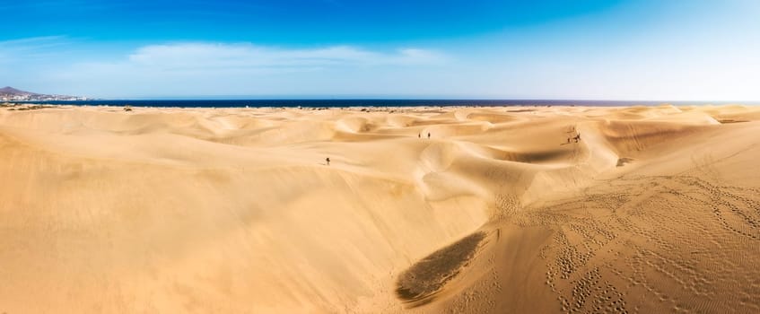 View of the Natural Reserve of Dunes of Maspalomas, in Gran Canaria, Canary Islands, Spain. Beautiful view of Maspalomas Dunes on Gran Canaria, Canary Islands, Spain.