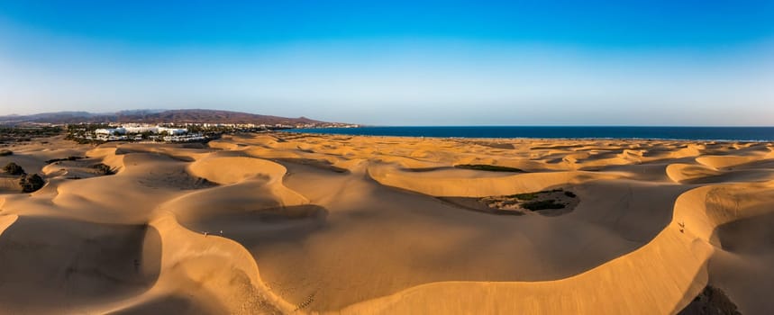 View of the Natural Reserve of Dunes of Maspalomas, in Gran Canaria, Canary Islands, Spain. Beautiful view of Maspalomas Dunes on Gran Canaria, Canary Islands, Spain.