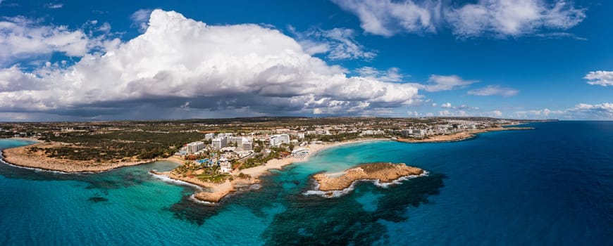 Aerial view of beautiful Nissi beach in Ayia Napa, Cyprus. Nissi beach in Ayia Napa famous tourist beach in Cyprus. A view of a azzure water and Nissi beach in Aiya Napa, Cyprus.