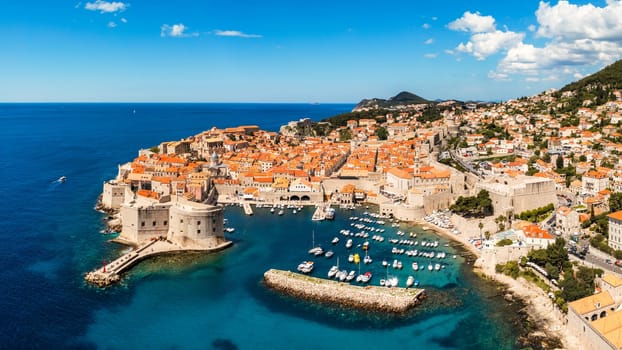 Dubrovnik a city in southern Croatia fronting the Adriatic Sea, Europe. Old city center of famous town Dubrovnik, Croatia. Picturesque view on Dubrovnik old town (medieval Ragusa) and Dalmatian Coast.