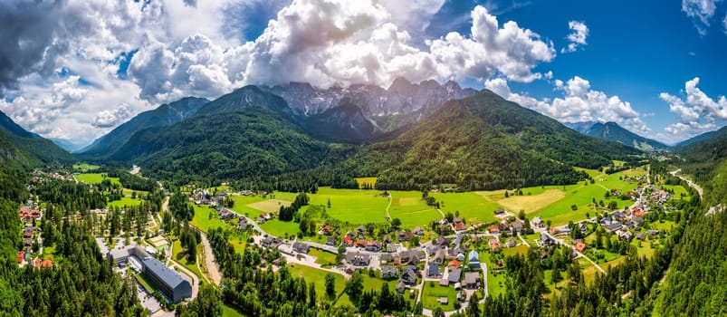 Gozd Martuljek town in Slovenia at summer with beautiful nature and mountains in the background. View of mountain landscape next to Gozd Martuljek in Slovenia, view from the top of Gozd Martuljek.