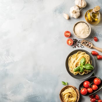 Pasta recipe preparation flatlay background with ingredients, spaghetti, olive oil, garlic, tomatoes and spices in the kitchen, homemade food recipe idea