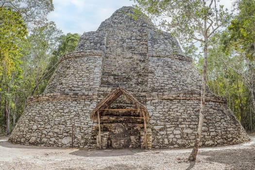 Coba, Mexico. Ancient mayan city in Mexico. Coba is an archaeological area and a famous landmark of Yucatan Peninsula. Cloudy sky over a pyramid in Mexico.