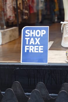 shop tax free text duty free shop sign on shop window ,