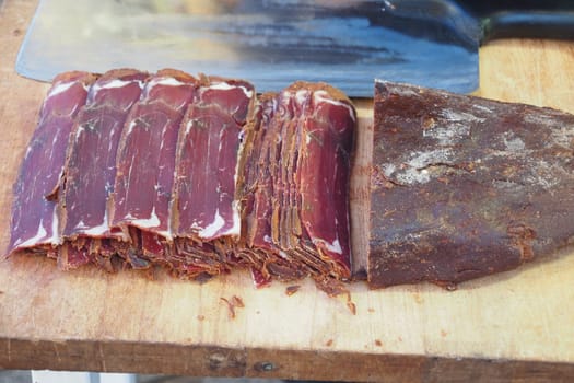 turkish meat pasturma on a a plate .