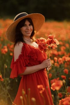 Woman poppy field red dress hat. Happy woman in a long red dress in a beautiful large poppy field. Blond stands with her back posing on a large field of red poppies