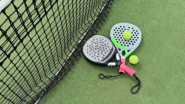 paddle rackets on the playing court. High quality photo