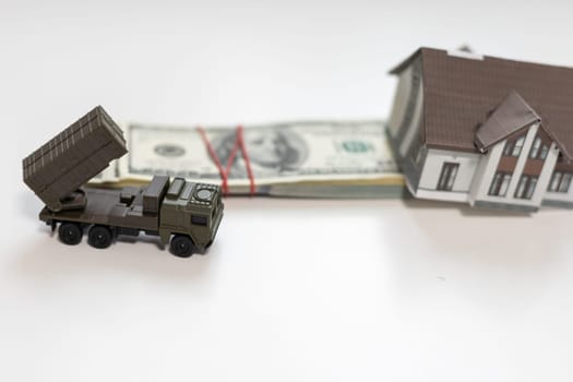 a toy military machine air defense and money. High quality photo