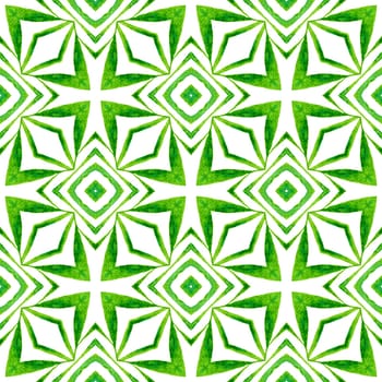 Watercolor ikat repeating tile border. Green delightful boho chic summer design. Textile ready bizarre print, swimwear fabric, wallpaper, wrapping. Ikat repeating swimwear design.
