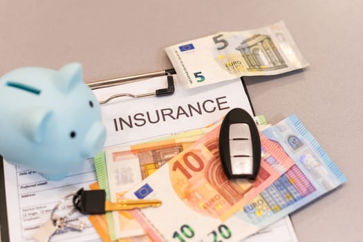 insurance form, folders, piggy bank and money. High quality photo