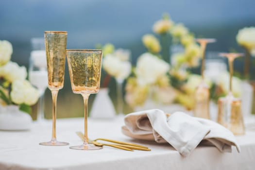 Festive table setting in pastel colored.