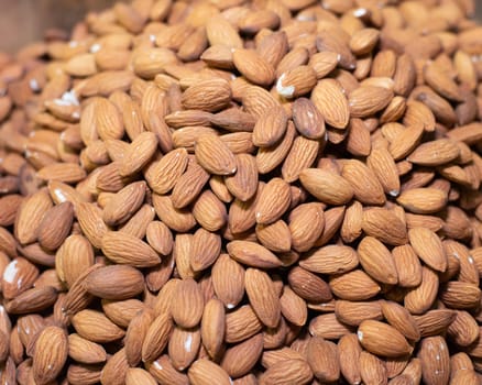 Close-up almonds. Lots of nuts. High quality photo