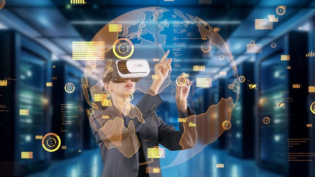 Woman selecting point world market data rotating graph analysis monitor by VR future global innovation interface digital infographic network technology virtual hologram animation server. Contraption.