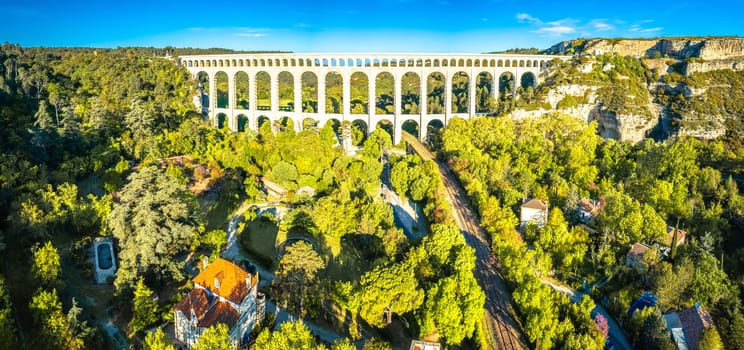 Roquefavour stone Aqueduct in green landscape panoramic aerial view, landmark of southern France