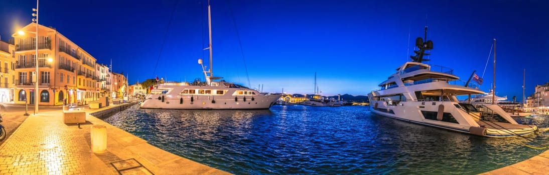 Saint Tropez village yachting waterfront panoramic view, famous tourist destination in southern France