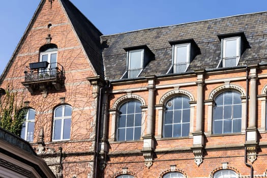 Traditional old red brick house with large windows. Copenhagen, Denmark. High quality photo