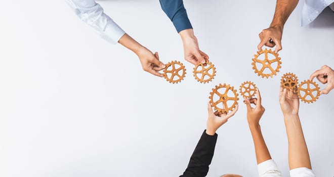 Top panorama banner of business team joining cogwheel in circular together symbolize successful group of business partnership and collective teamwork in workplace with productive efficiency. Prudent