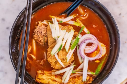 Curry Laksa, traditional spicy noodle soup in Melaca, Malaysia