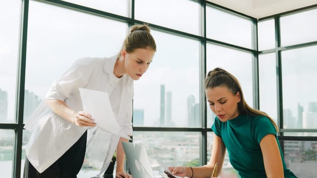 Smart businesswoman present start up project while executive manager listen carefully. Professional business team working together, sharing, discussing, thinking about business idea. Tracery