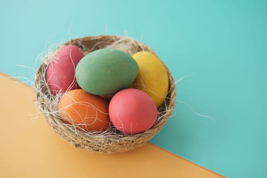 easter concept with egg on pink background..