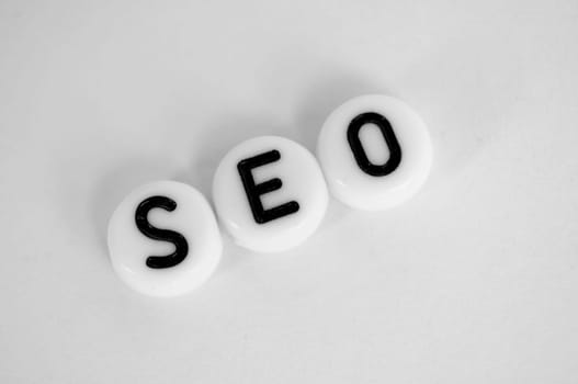 Top view of SEO text representing search engine optimization.