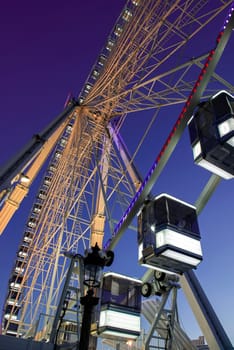 Big luminous ferris wheel in Paris, France