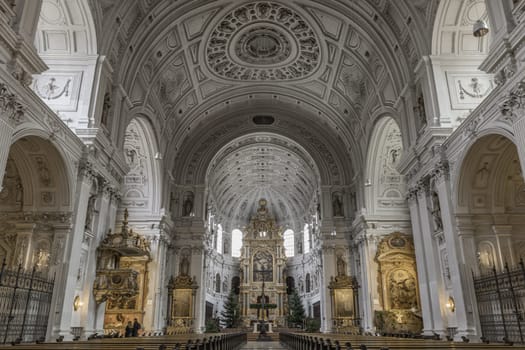 Munich, Germany - Dec 21, 2023 - Interior architecture view of St. Michael's Church (Michaelskirche Jesuit church) in Munich pedestrian zone. It is the largest Renaissance church north of the Alps. Space for text, Selective focus.