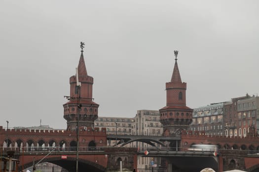 Berlin, Germany - Dec 19, 2023 - Oberbaumbrücke or Oberbaum Bridge over the Spree River in Berlin. East arcades, One of the most important bridges in Berlin. Space for text, Selective focus.