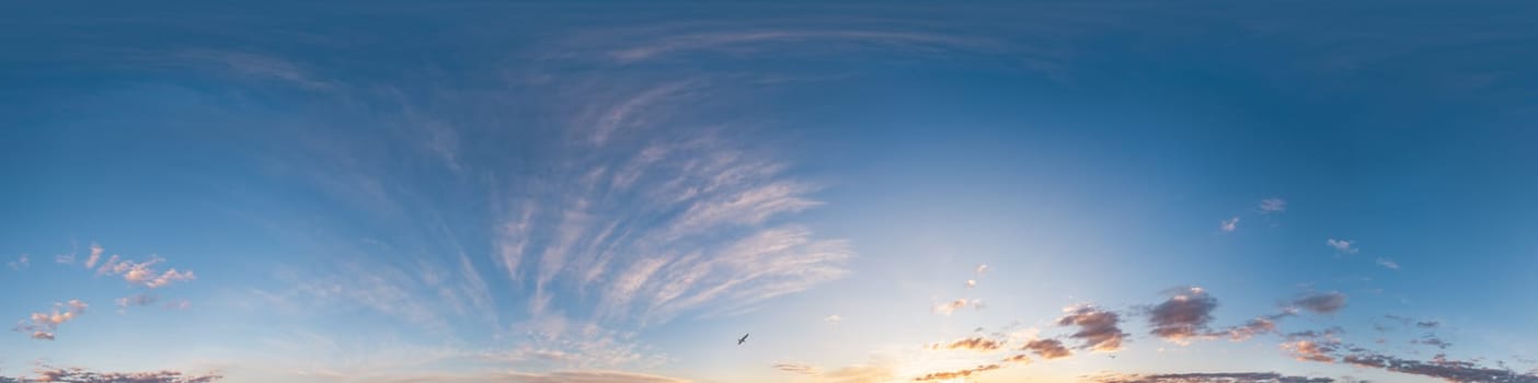 Bright sunset sky panorama with Cirrus clouds. Seamless hdr spherical equirectangular 360 panorama. Sky dome or zenith for 3D visualization, game and sky replacement for aerial drone 360 panoramas.