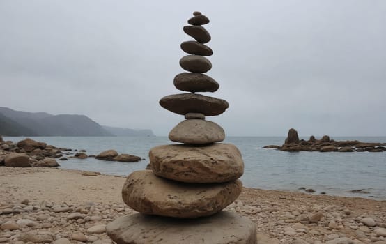 A stack of rocks beside a flowing river, creating a natural landscape with a balance of elements like water, wood, grass, and terrestrial plants