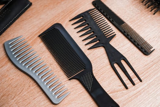 Different combs on the table in the barbershop.