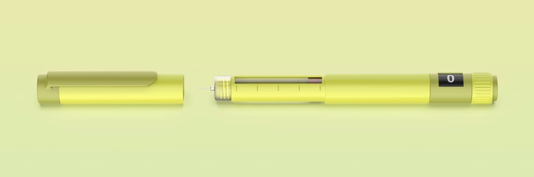 Insulin injector pen on green background