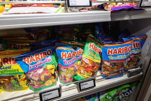 Haribo fruit candies on a shelf in a store. Sweets for children and adults. Copenhagen, Denmark - May 15, 2024.