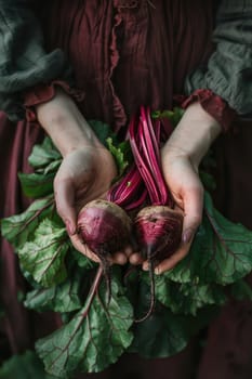 Harvest in the hands of a woman in the garden. Selective focus. nature.