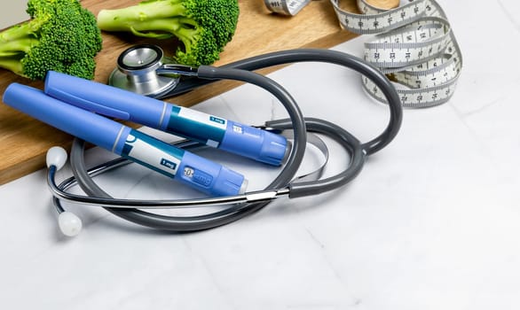 Ozempic Insulin injection pen or insulin cartridge pen for diabetics. Medical equipment for diabetes parients. Copenhagen, Denmark - January 1, 2024.