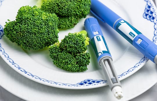Ozempic Insulin injection pen or insulin cartridge pen for diabetics. Medical equipment for diabetes parients. Copenhagen, Denmark - January 1, 2024.