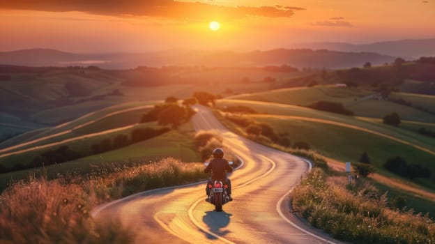 A motorcyclist taking a break on a winding country road.