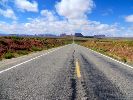 Lonely Desert Highway near Monument Valley, Wild West Road Trip. High quality photo